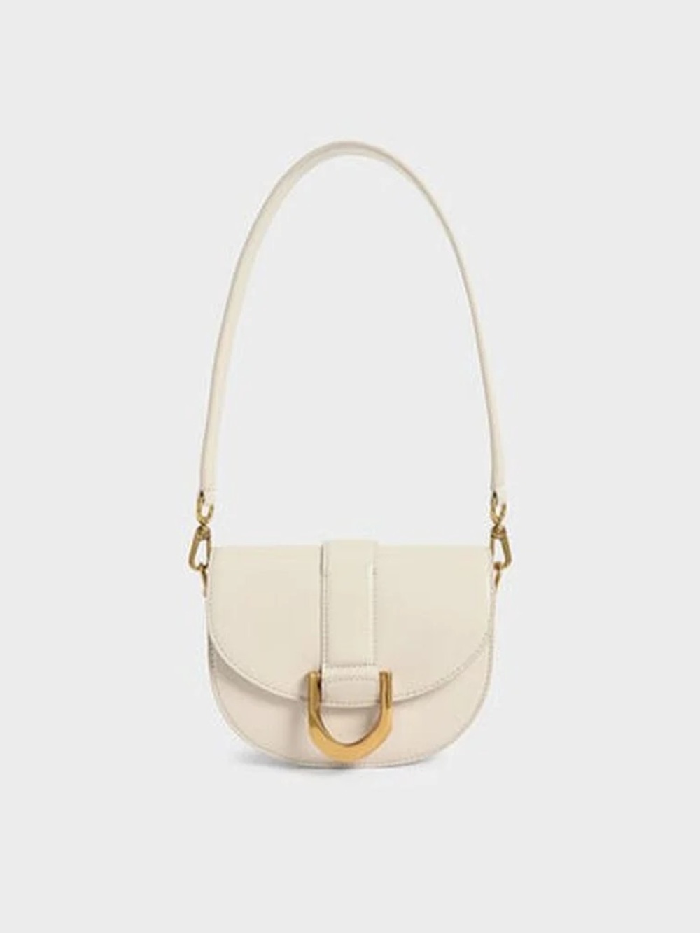 Charles & Keith Mini Gabine Cream Saddle Shoulder Bag with Gold Accent